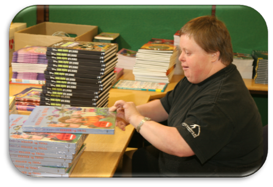 Person packing books